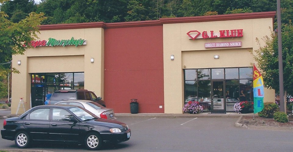 Olympic Gateway Shopping Center exterior painting